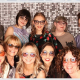 posing in eyewear in photo booth